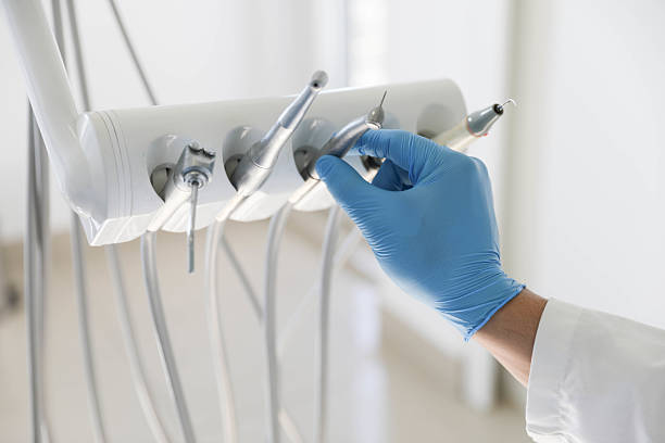Professional Tooth Extraction technician working in Marin City, CA